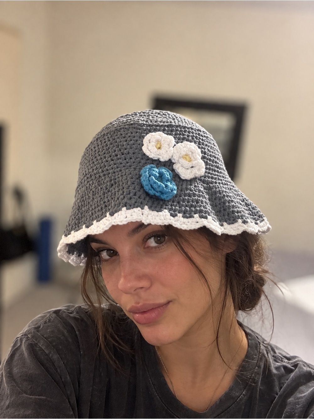 Grey Crochet Bucket Hat with White Trim and Blue Floral Accents